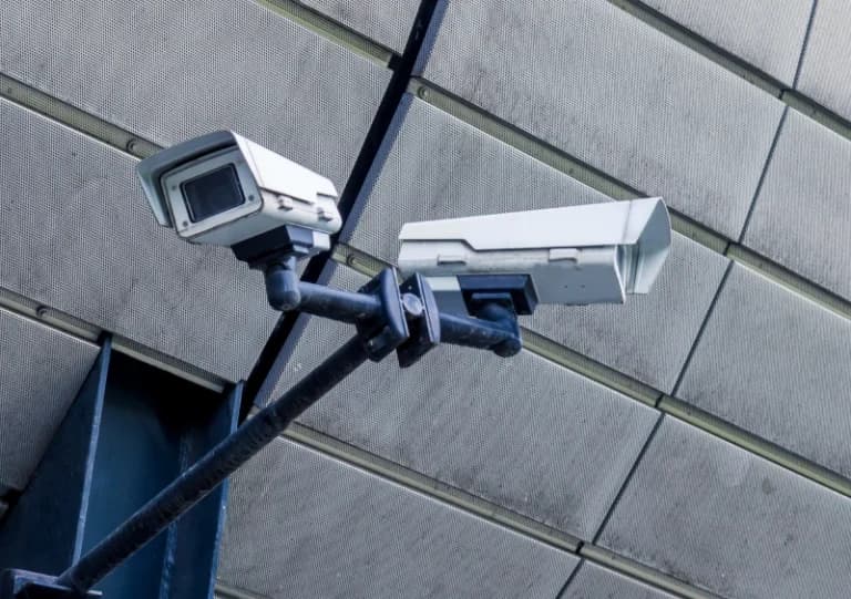 SPS Commercial security cameras mounted on concrete building