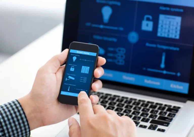 SPS Smart automation dashboard on smartphone and laptop screen