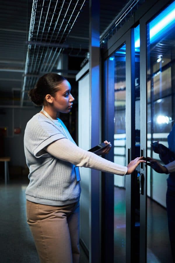 IT administrator operating server cabin security system