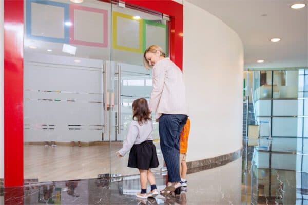 Secure access control keypad and card reader installed at day care center entrance